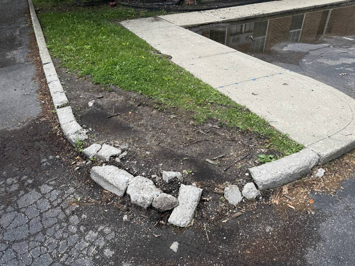 Weathered concrete surface showing freeze-thaw wear