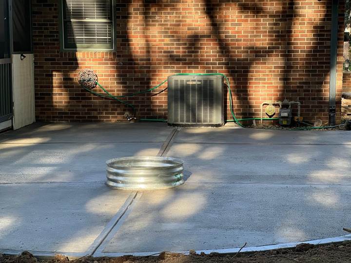 Patio with a steel fire pit ring