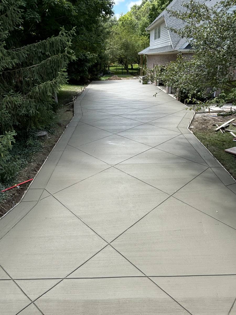 Completed GoldenPaw Concrete driveway